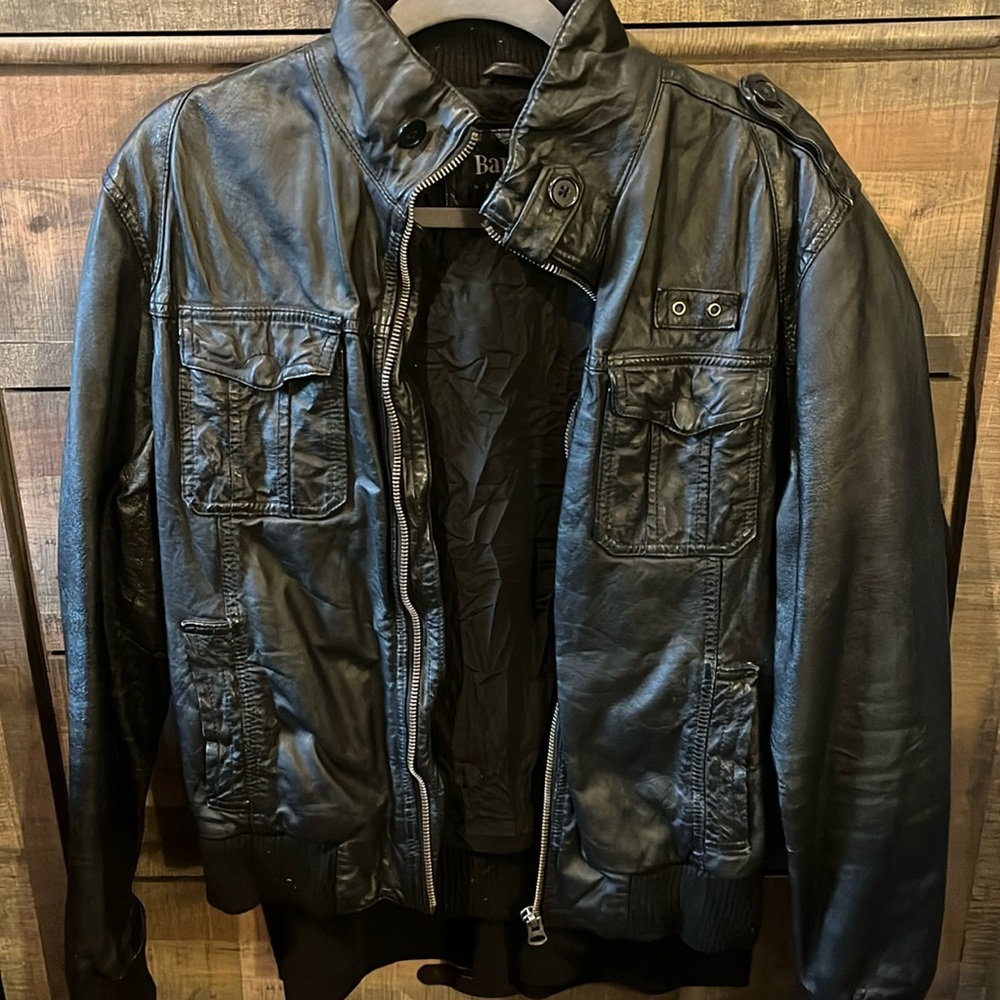 Beautiful Barney’s black, leather, bomber jacket, size, medium. Authentic